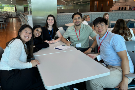 Group of Interns sitting at a table together