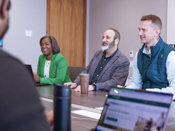 Evernorth employees sitting together at a table