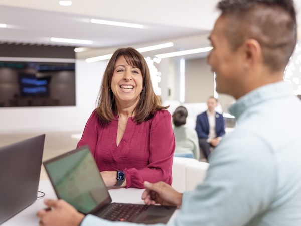 Evernorth employees working from home in front of her computer