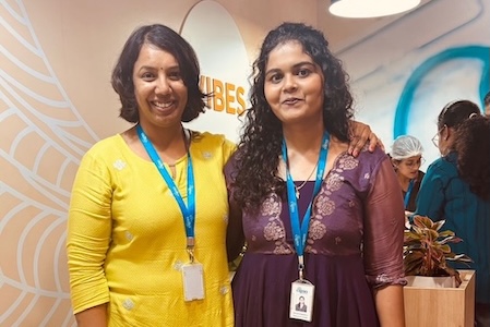 Two colleagues from our India office smiling together