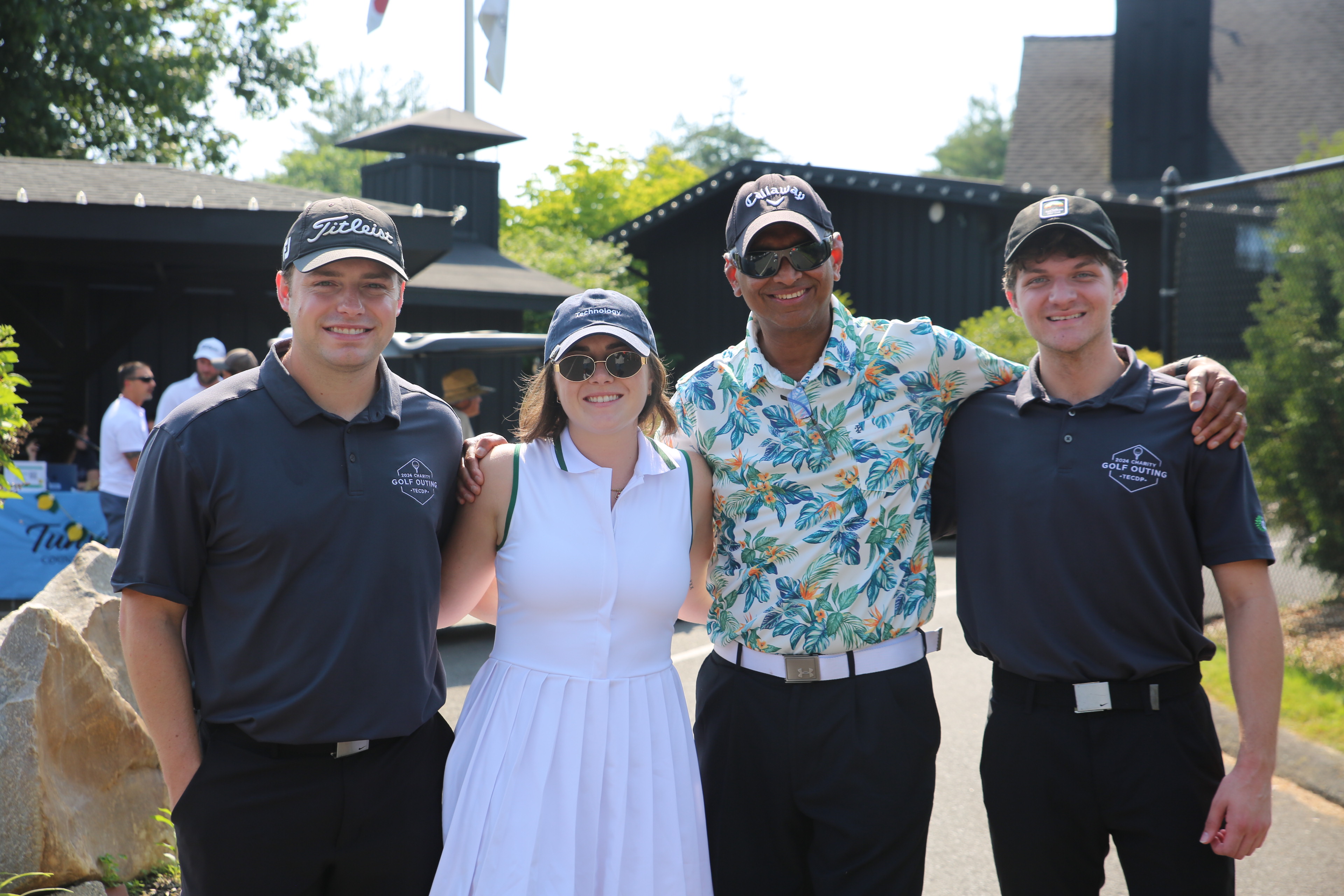 TECDP associates posing at a program golf outing