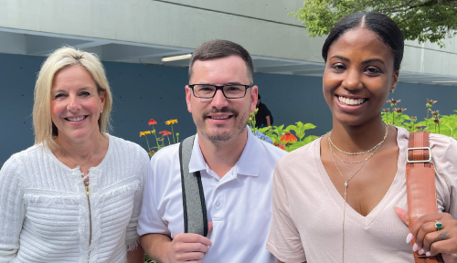 Employees posing for a group photo