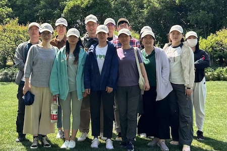 China employees posing for a photo during a company outing