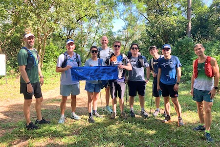 Group of employees from Hong Kong posing during an athletic event