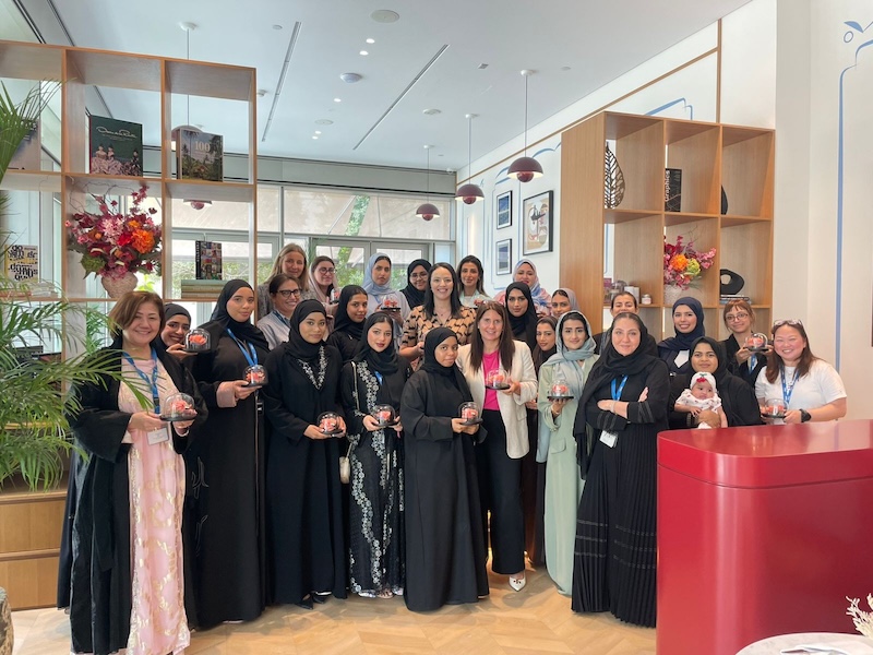 UAE employees posing for a group photo