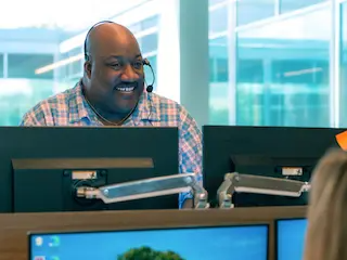 Employees working in their cubicles