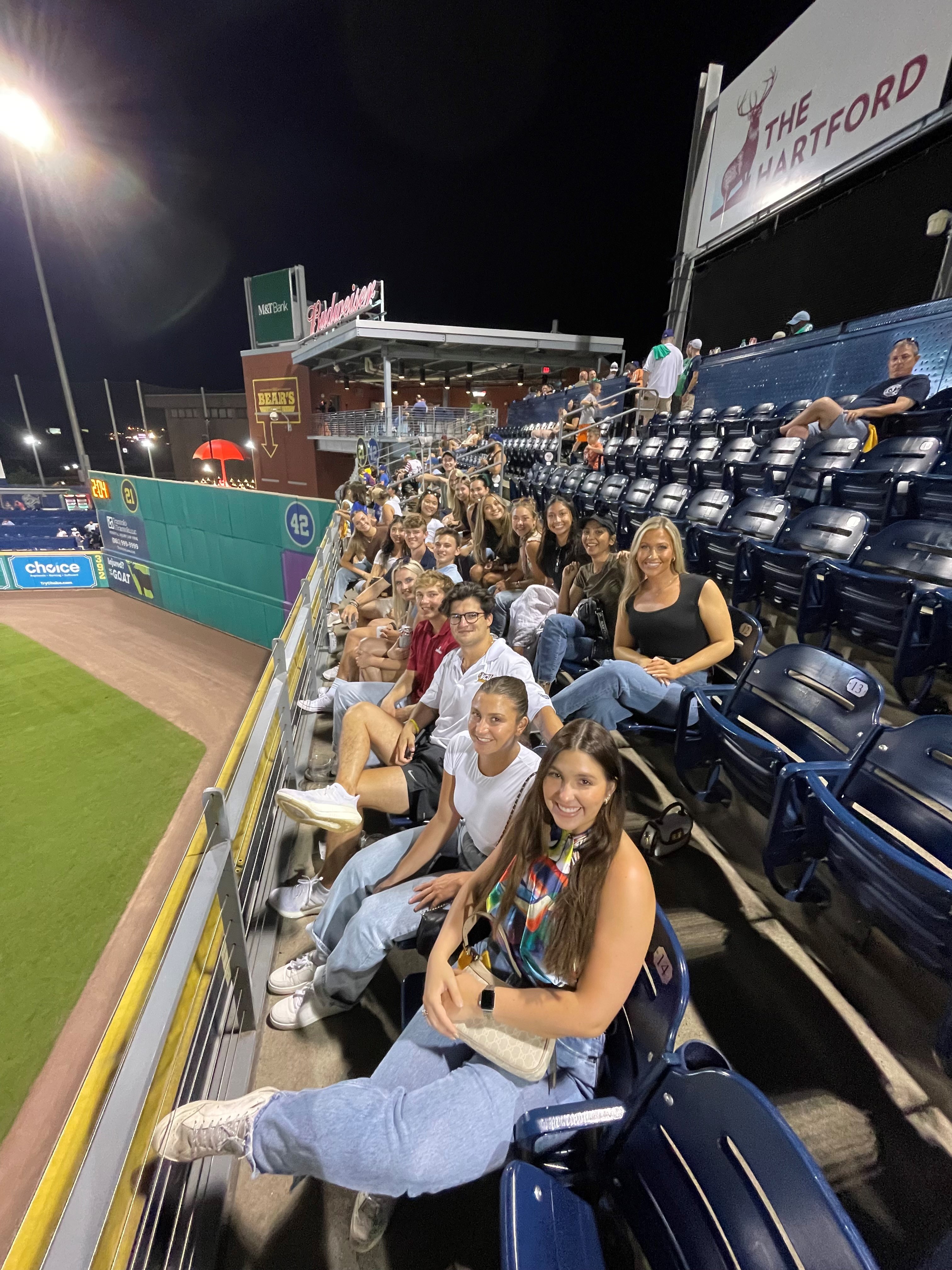 SCDP posing for a photo at a baseball game