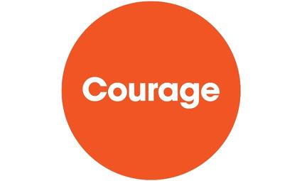 Orange circle containing text of the second C - Courage