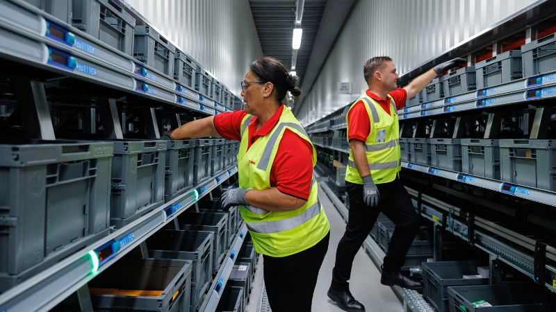 Female and Male team members working inside the ADC