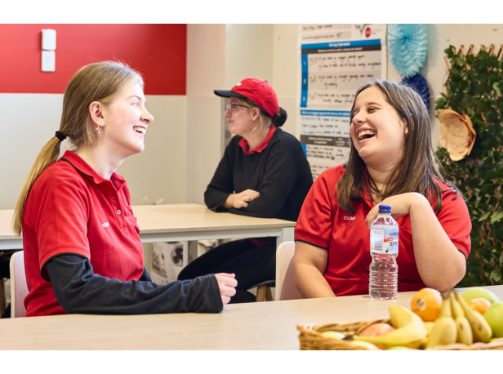 Two Coles Supermarket employees enjoying a break