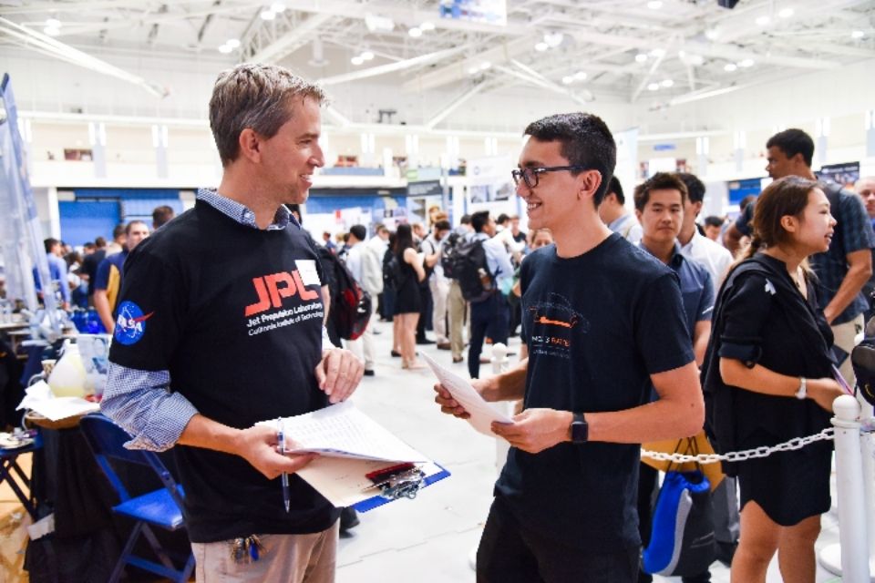Taking a picture at a JPL event