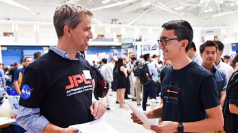 Taking a picture at a JPL event