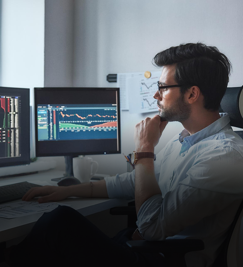 A man looking at a screen