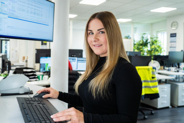 A woman wearing a hard hat