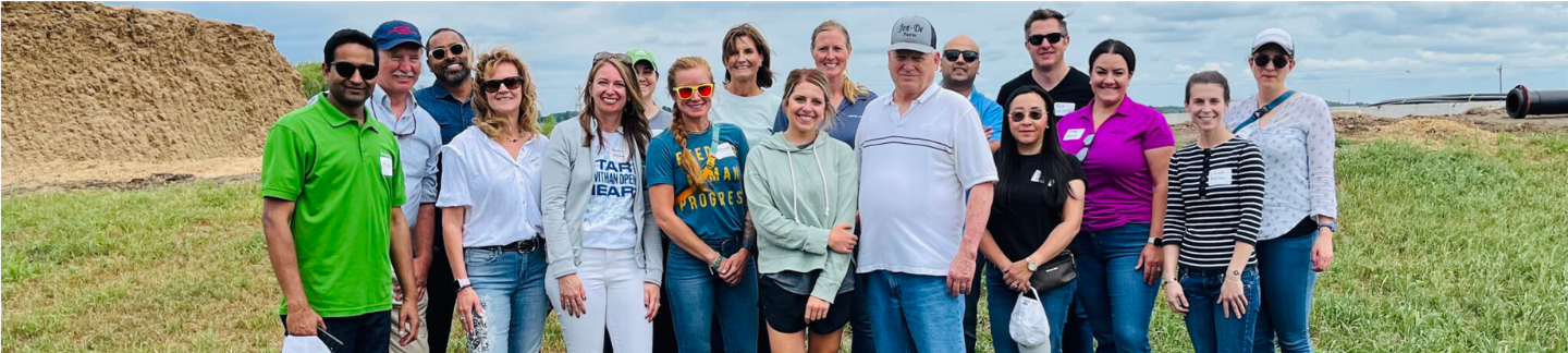 Land O'Lakes leaders at a farm to learn about sustainability