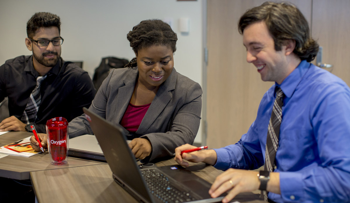 CGI employees laughing together