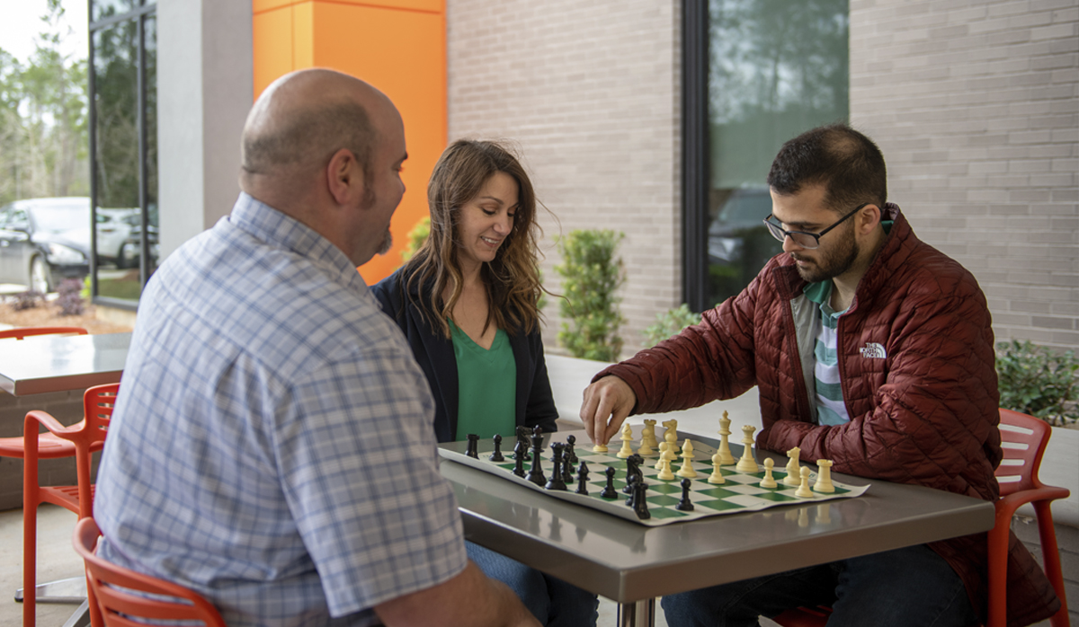Globalstar employees playing chess