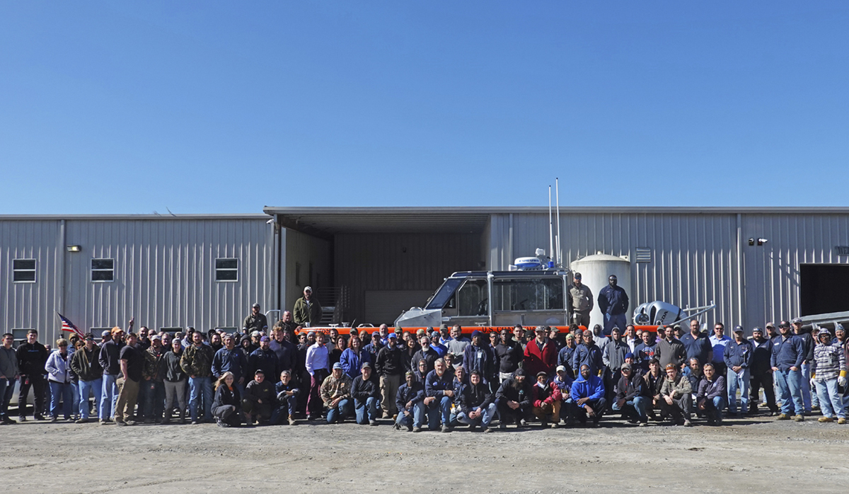 Picture of the Metal Shark Boat Team outside