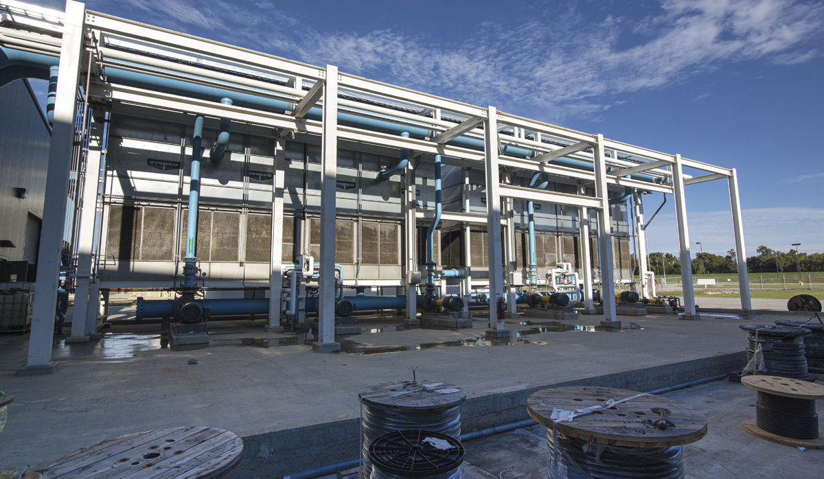 SNF Flopam facility with blue sky and green grass behind it