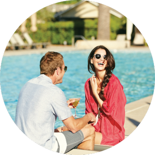Female with her hair flowing in the wind, taking in nature.
