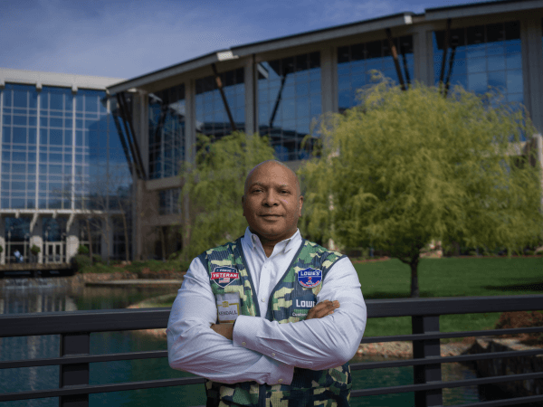 Military Veteran Kendall M. standing outside of Corporate headquarters