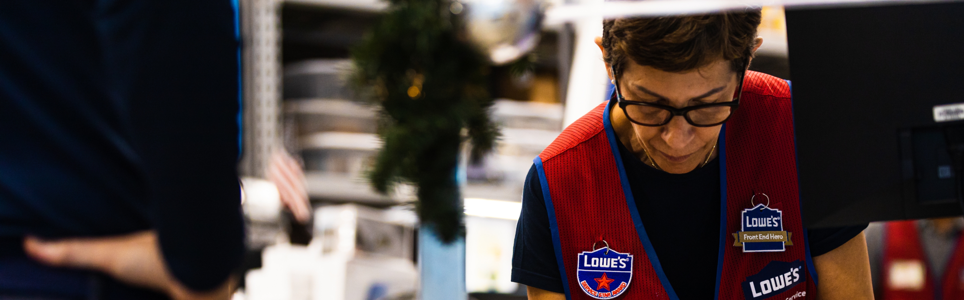 Lowe's store associate helping customer