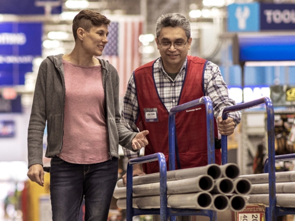 Store associate assisting a customer