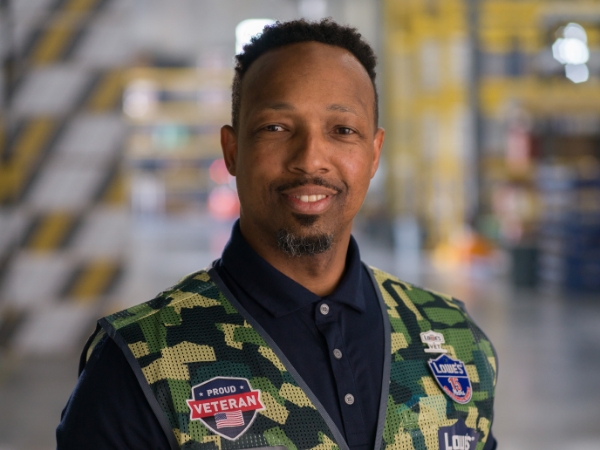 Supply Chain leader standing in a distribution center