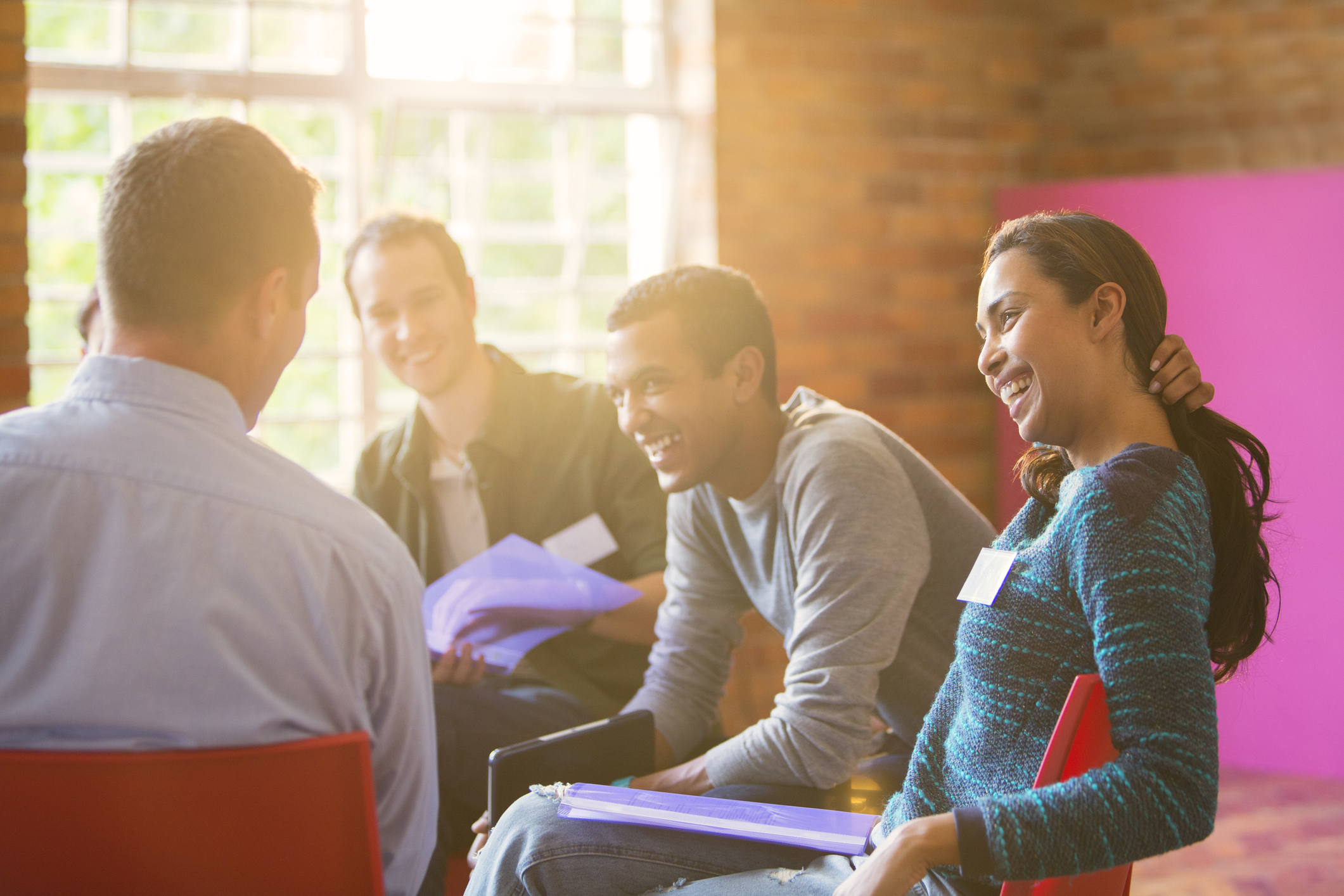 Employees participating in a group discusion