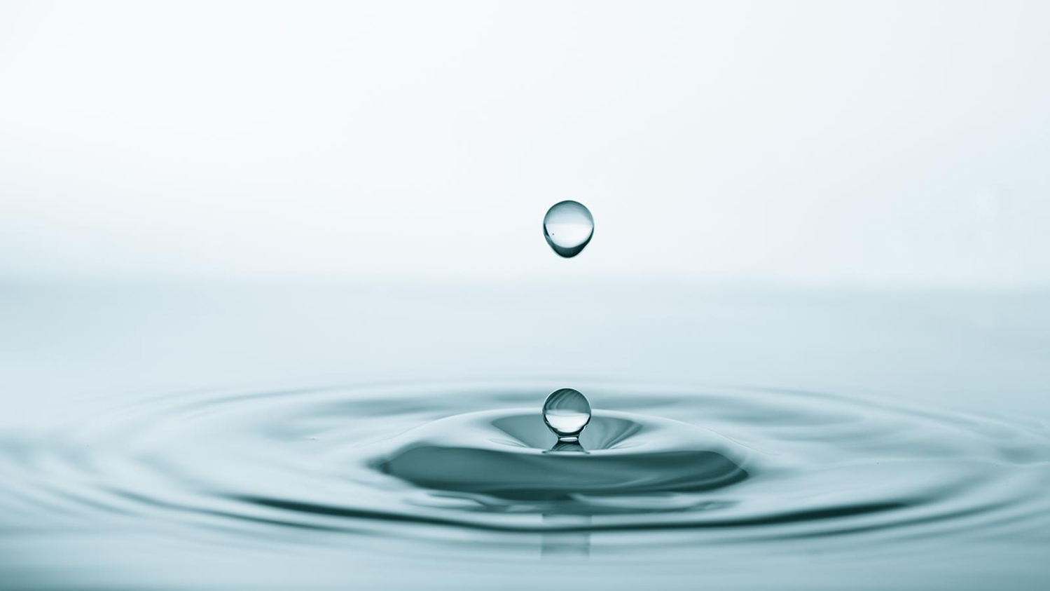 A water droplet causing a ripple