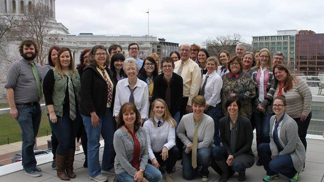 Magellan employees gathered for an image outside