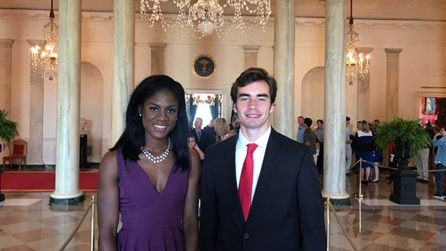 Two people are at an event