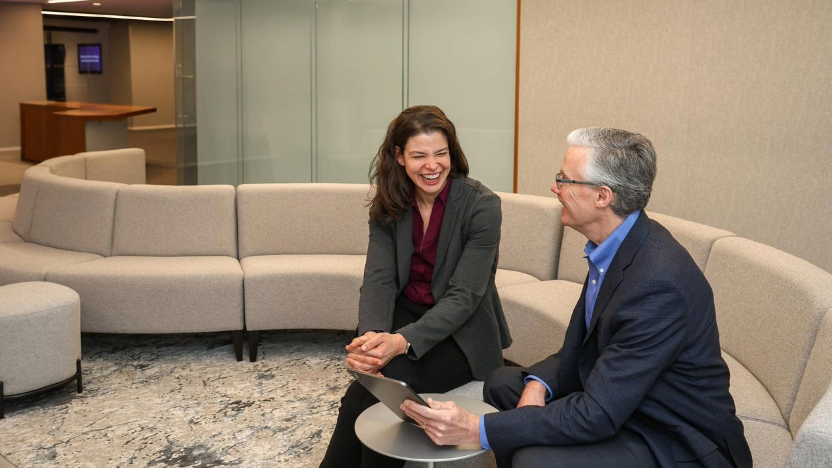 group standing at work table