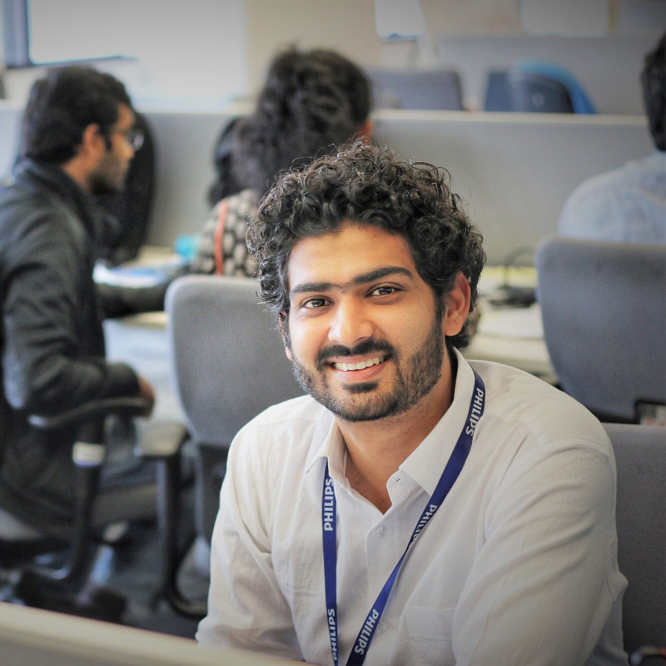 Team members at Philips working together