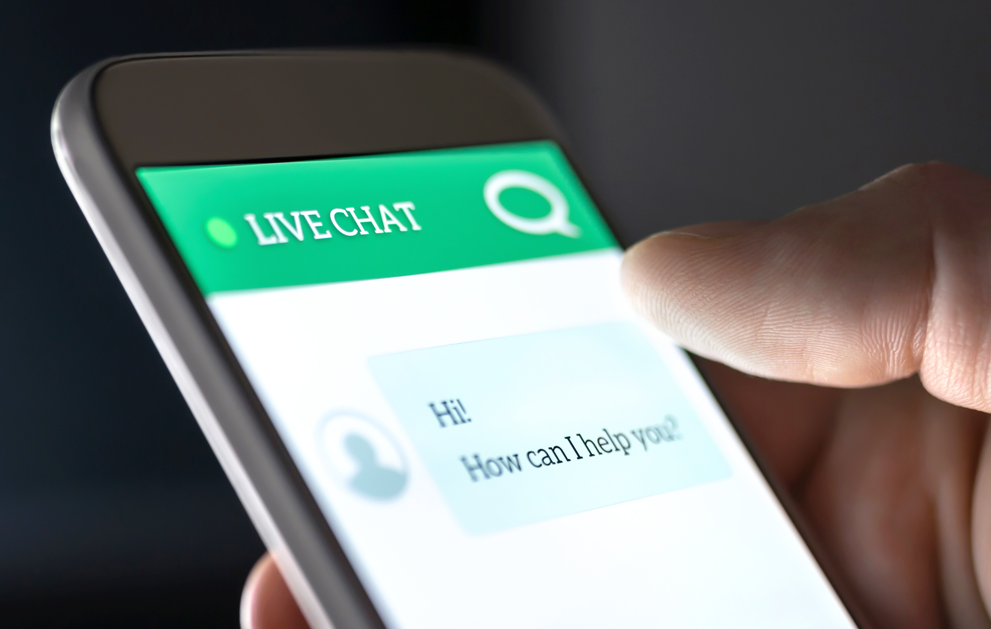 Someone having a conversation with a chatbot