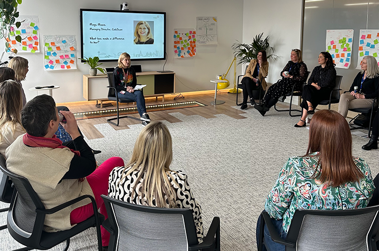 Women gathered in a meeting room