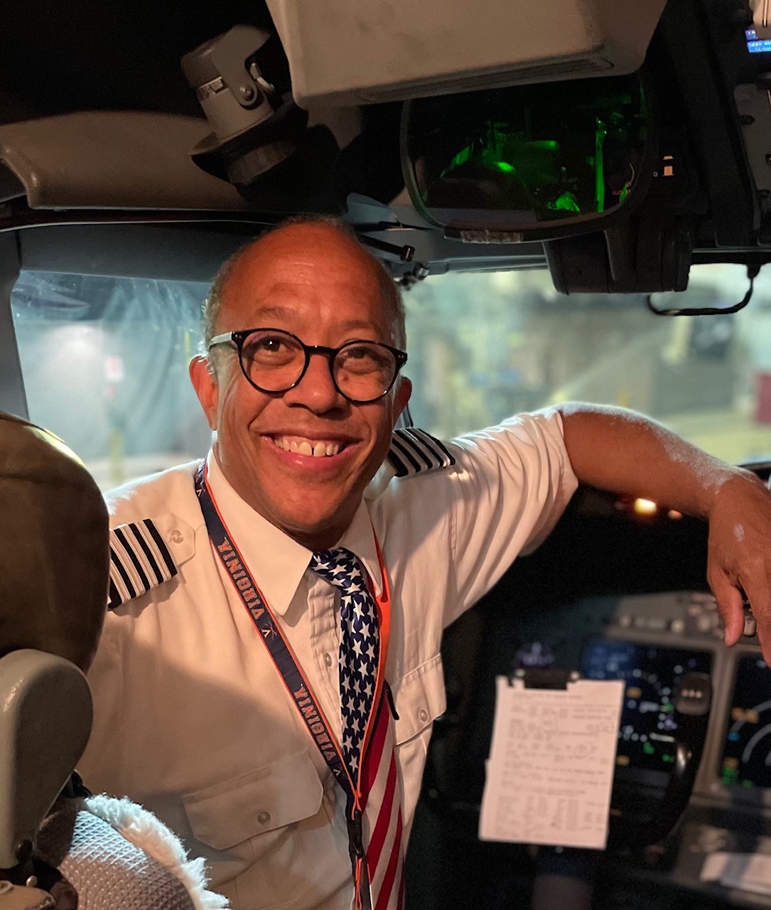 Captain Bryan T. smiling from the flight deck of a Southwest 737