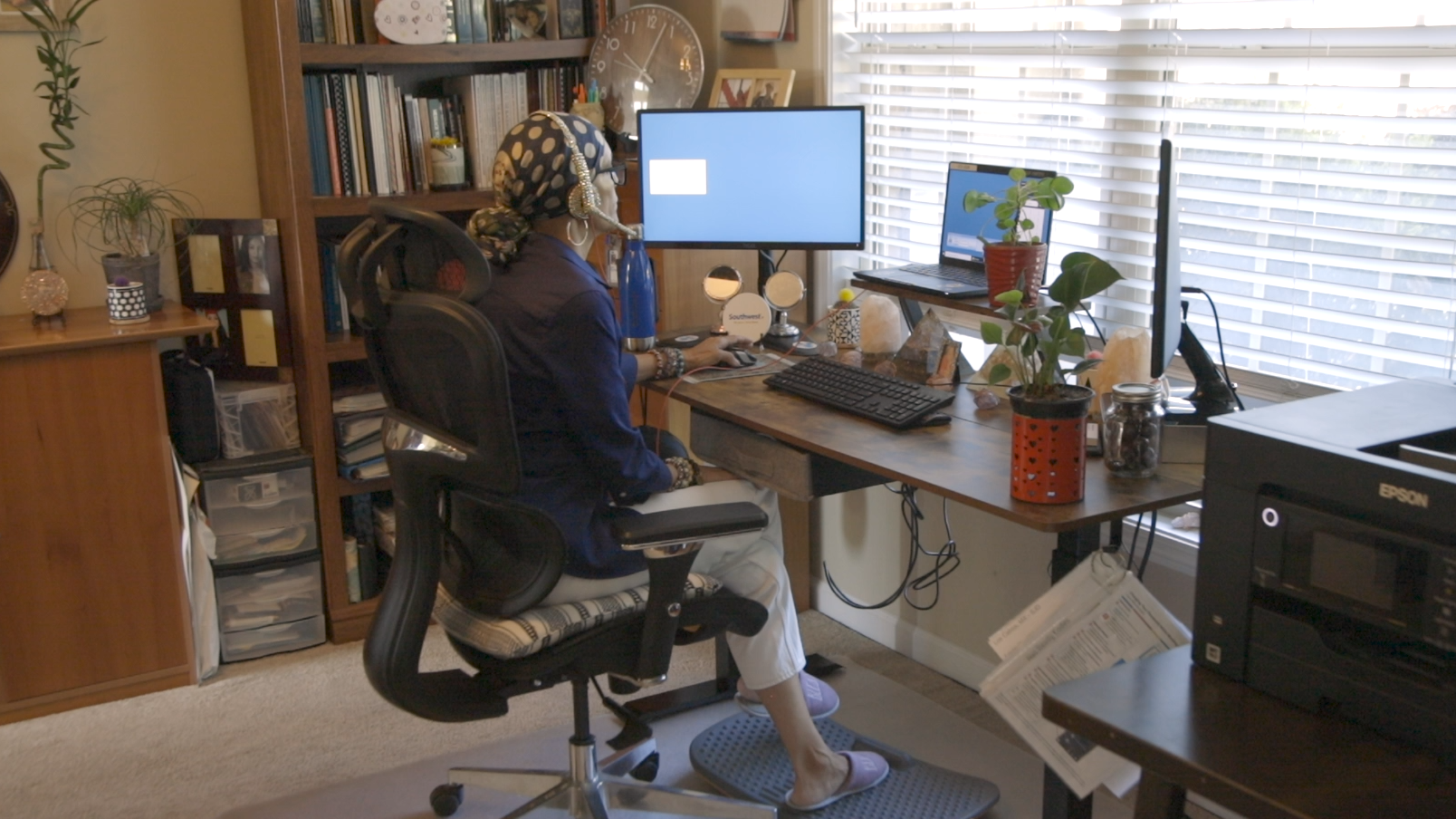 Image of Dedra, a CS&S Representative working remotely from her home.