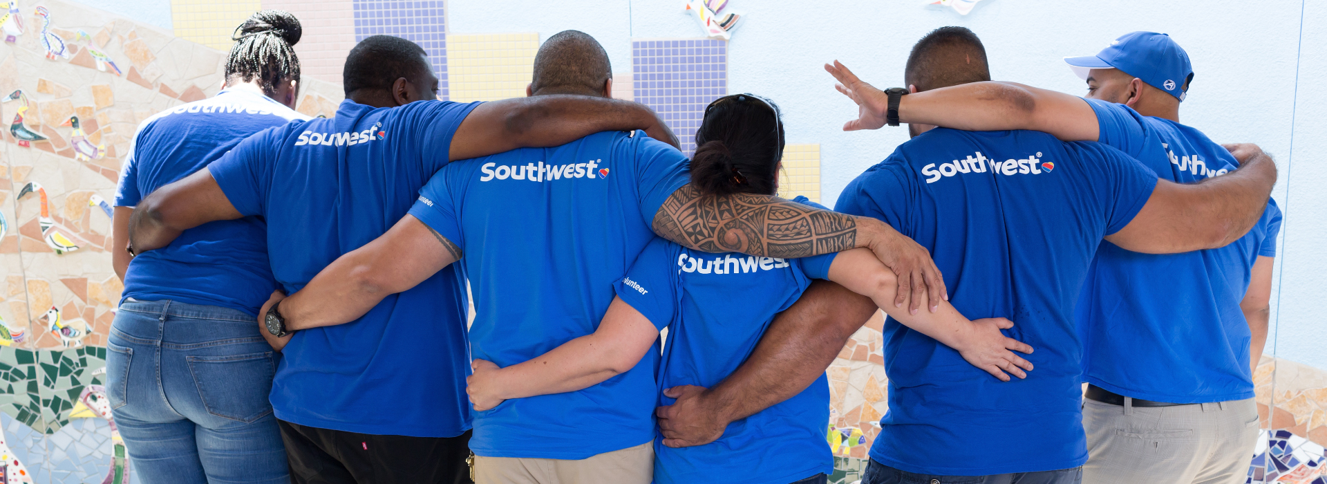 Group of Southwest Employees with their arms around one another