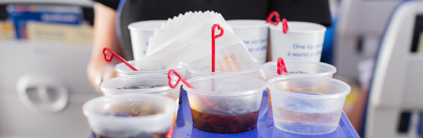 Southwest Flight Attendant serving drinks