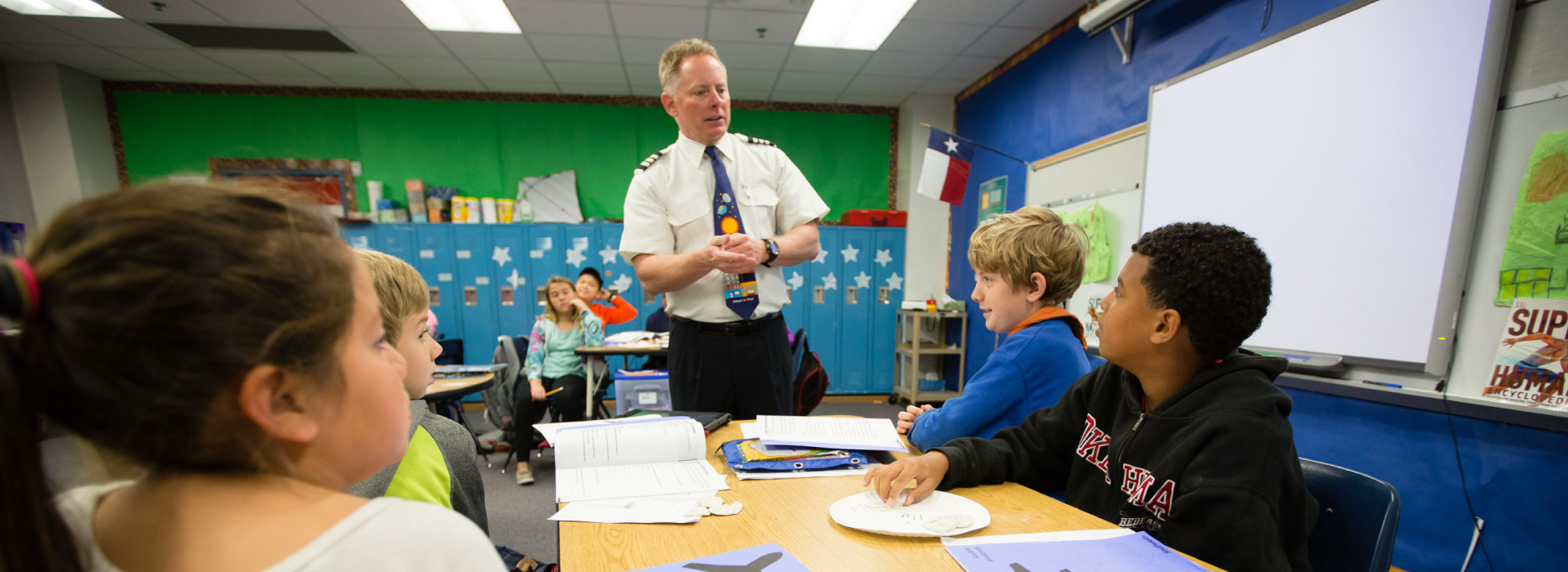 A Southwest Pilot speaking to elementary school students