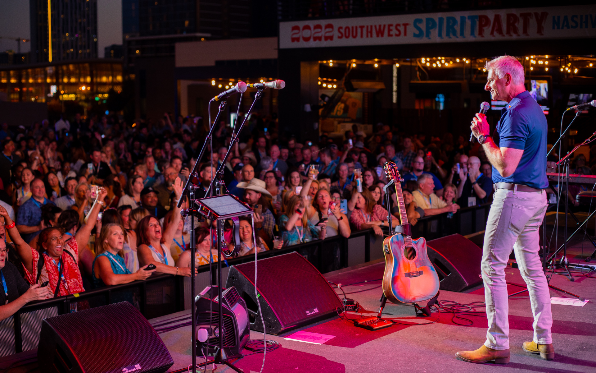 Southwest Airlines CEO Bob Jordan speaking on stage at the Southwest Spirit Party