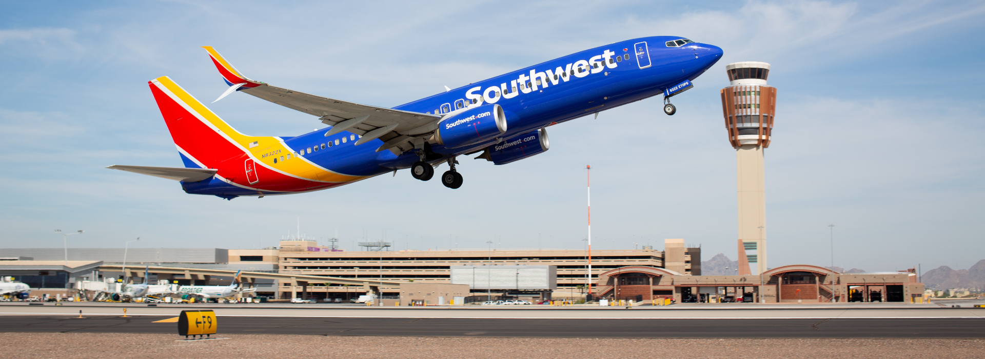 Southwest airplane taking off from a runway