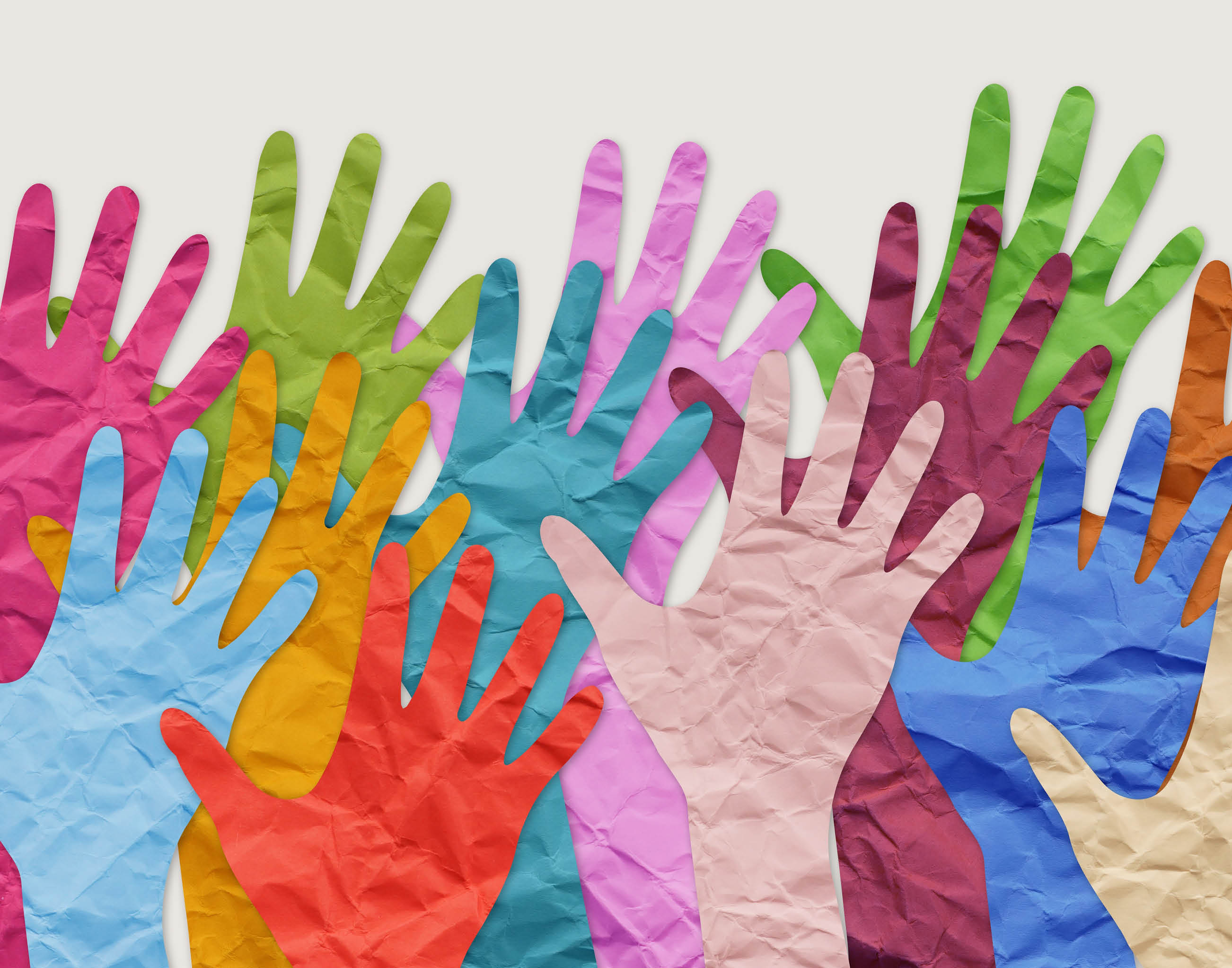 Colorful hands with tan background